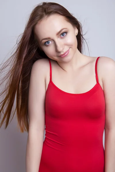 Beautiful young red haired woman cheerfully — Stock Photo, Image