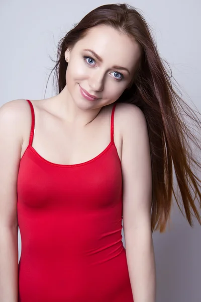 Beautiful young red haired woman cheerfully — Stock Photo, Image