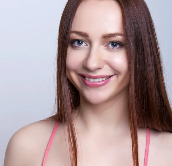 Beautiful young red haired woman cheerfully posing — Stock Photo, Image