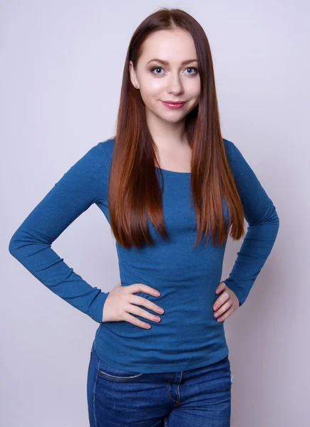 Beautiful young red haired woman cheerfully — Stock Photo, Image