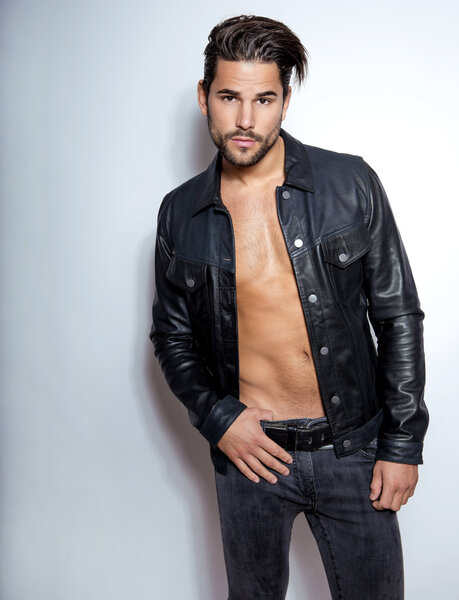 handsome young man posing in casual clothes