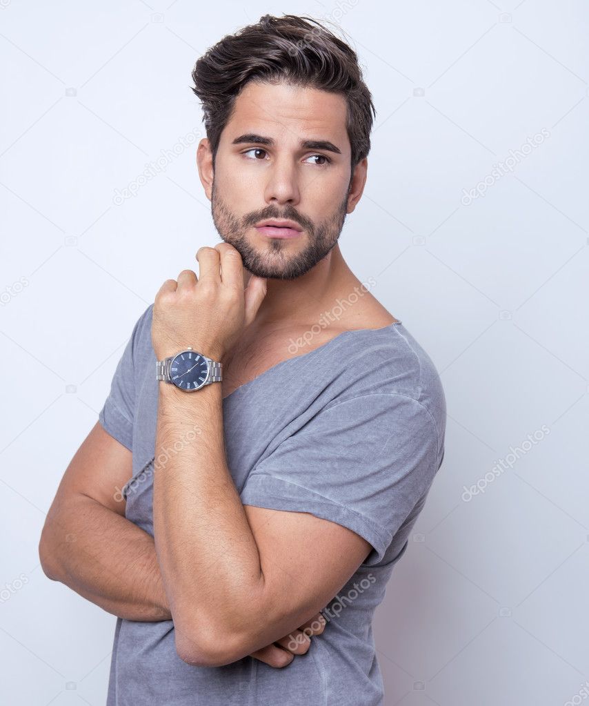 handsome young man posing in casual clothes