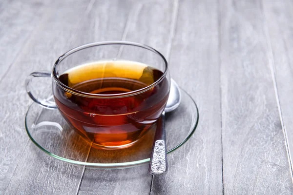 Freshly brewed tea in glass cup — Stock Photo, Image