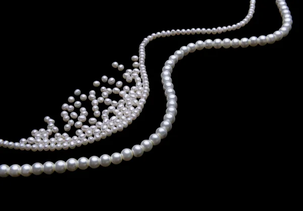 Beautiful pearls on black — Stock Photo, Image