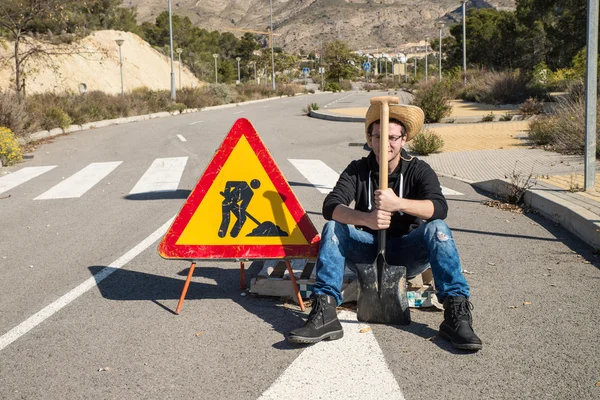 Lazy guy on a  road — Stock Photo, Image