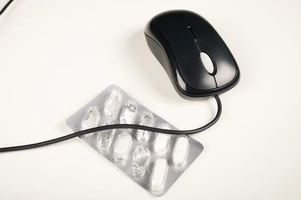 Pill blister and mouse — Stock Photo, Image