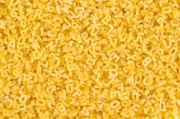 Pasta letters background — Stock Photo, Image