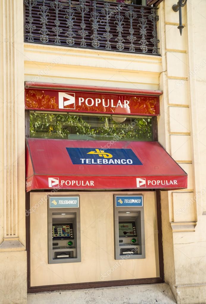 MADRID, SPAIN - FEBRUARY 12, 2015: A Banco Popular branch. Popular  is one of the medium sized Spanish banks repeatedly seen struggling during the financial turmoil in the eurozone