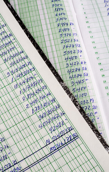 Handwritten accounting on the open pages