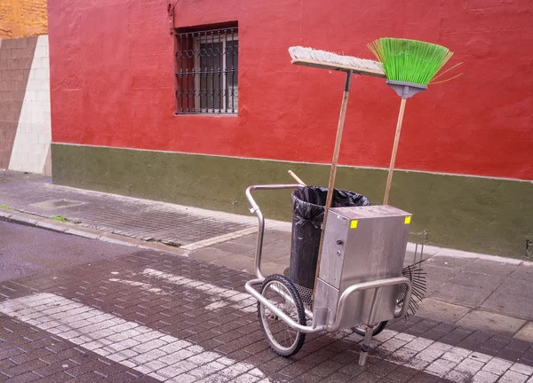 Cleaning trolley with brooms — Stock Photo, Image