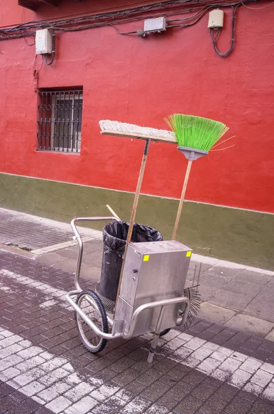 Cleaning trolley with brooms — Stock Photo, Image
