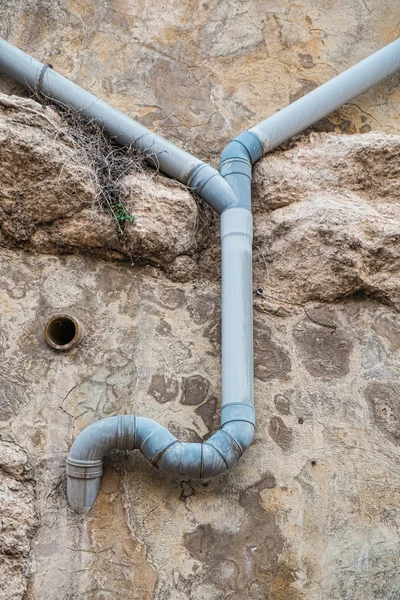 Sewage pipes running down — Stock Photo, Image