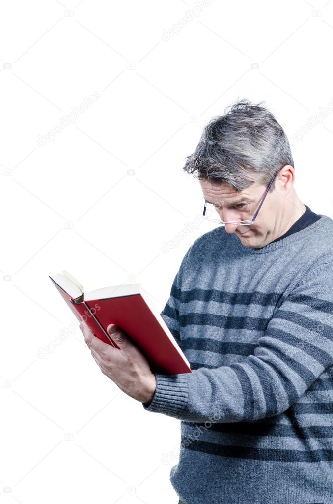 Guy finding holding a book