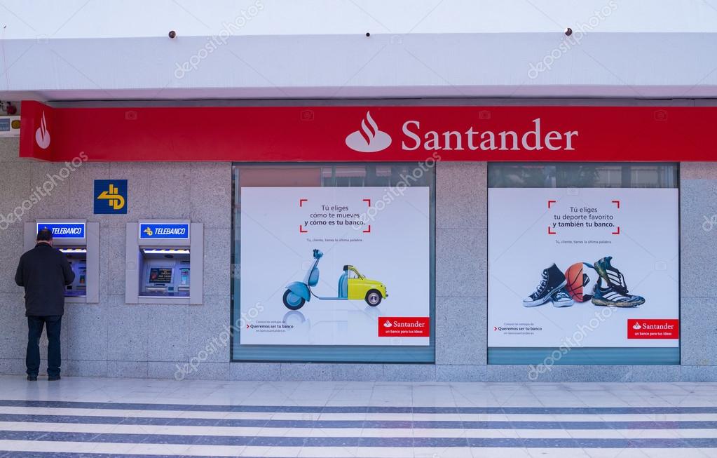 MADRID, SPAIN - FEBRUARY 24, 2015: A Santander branch. Santander is a major player in  Europes banking business and one of the banks that required no bailout during the financial crisis