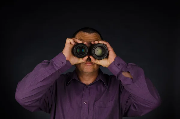 Man with photography lenses — Stock Photo, Image