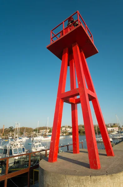 Red beacon in harbor — Stock Photo, Image