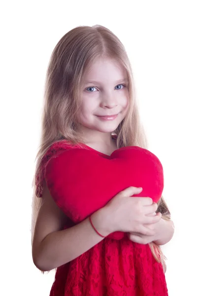 Menina bonito segurando coração vermelho — Fotografia de Stock