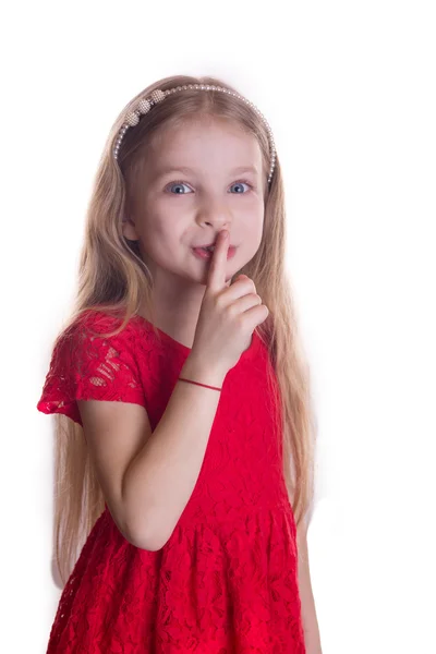 Девушка подкладывает палец к губам — стоковое фото