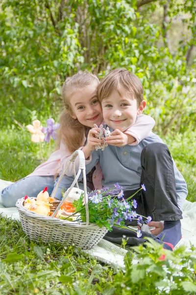 Brother and sister with easter decor — Stock Photo, Image