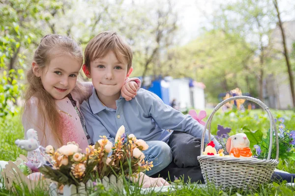 Brother and sister with easter decor — Stock Photo, Image