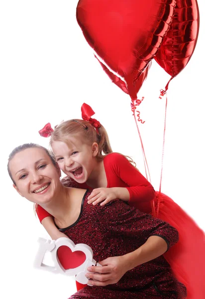 Moeder en dochter met ballonnen — Stockfoto