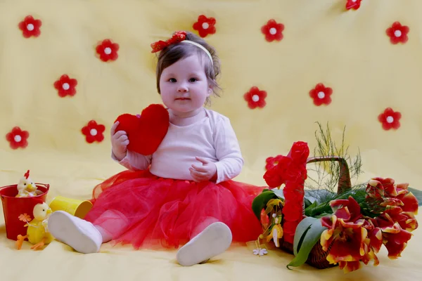 Meisje van de baby in jurken — Stockfoto