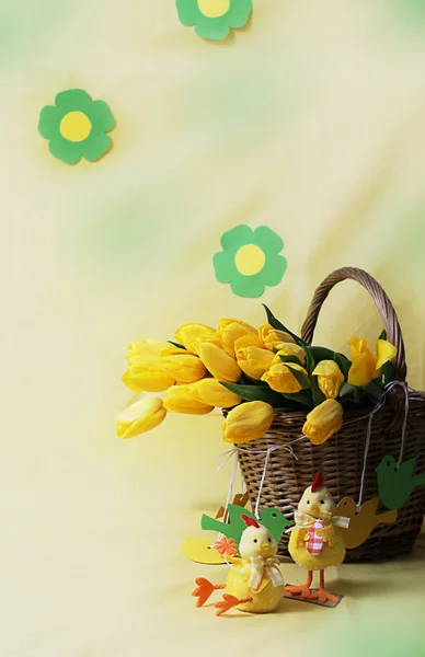 Yellow tulips in basket — Stock Photo, Image