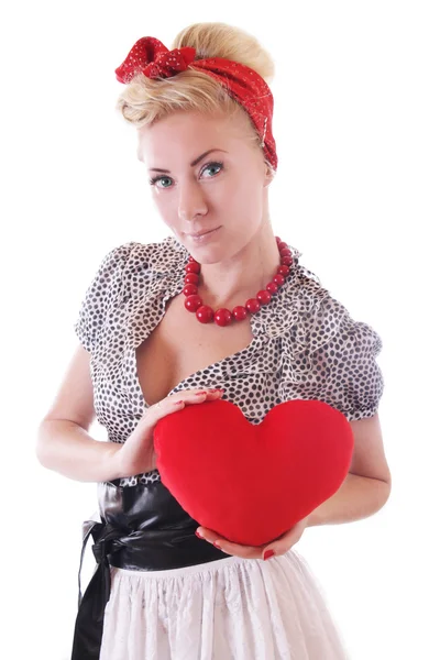 Pinup femme tenant coeur en peluche — Photo