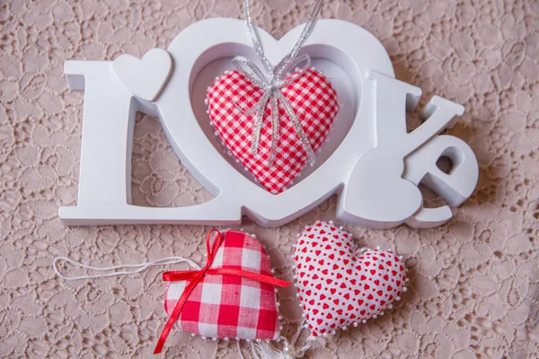 Word love and handmade hearts — Stock Photo, Image