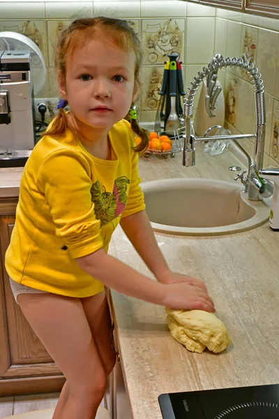 Child Girl Makes First Steps Cooking Kneads Dough Baking — Stock Photo, Image