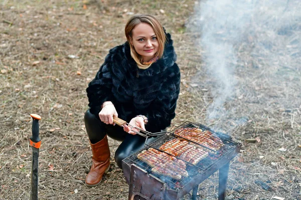 Beautiful Woman Fries Sausages Grill Early Spring Stock Photo