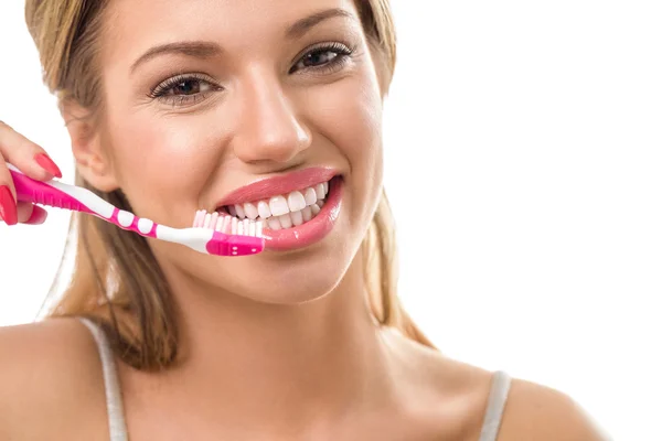 Donna sorridente durante il lavaggio dei denti — Foto Stock