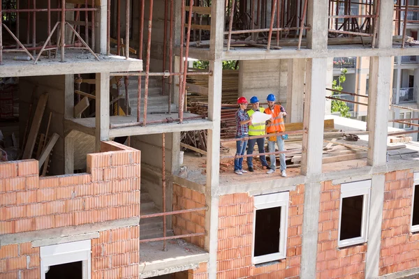 Monitoring team on open air building construction — Stock Photo, Image