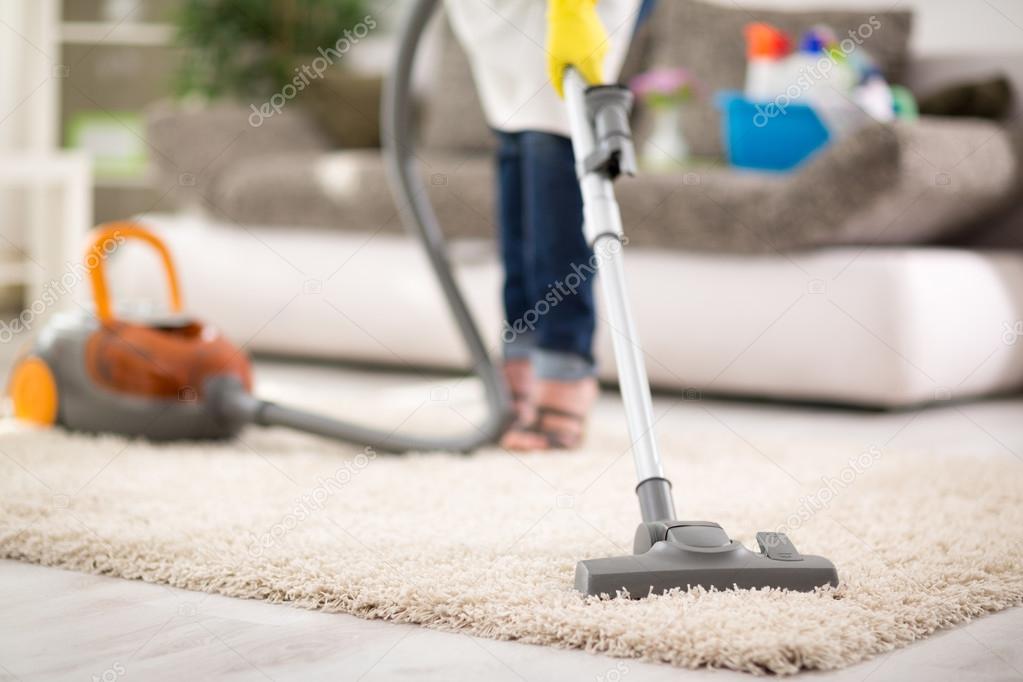 woman Vacuuming carpet