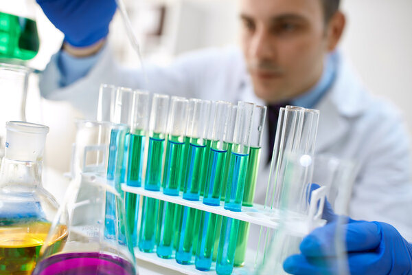 glass test tubes filled with liquid for an experimen