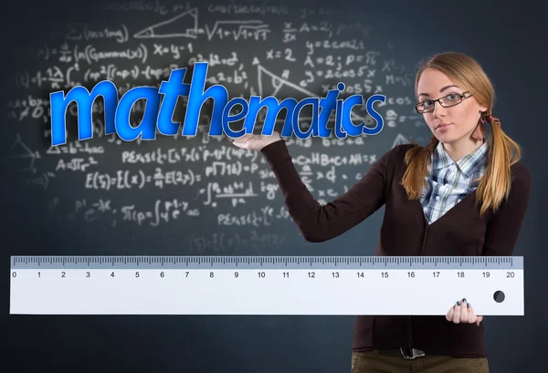 Student girl  with big ruler — Stock Photo, Image