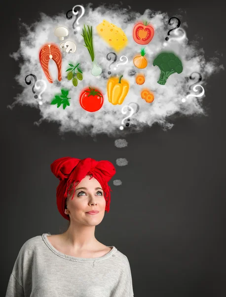 Young woman thinking about healthy food — Stock Photo, Image