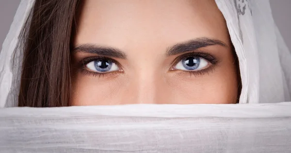 Blue eyes and scarf — Stock Photo, Image