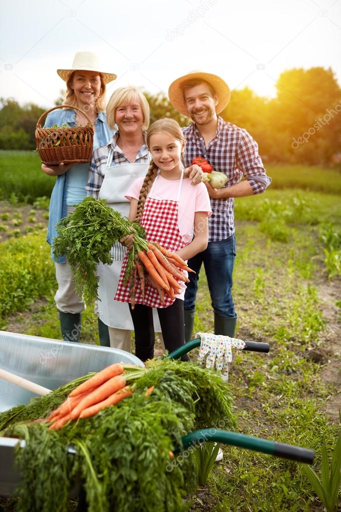 Rural family with vegetables