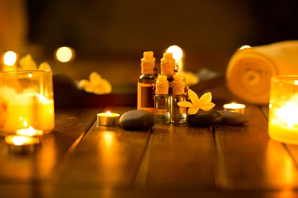 Massage oils in muffled light — Stock Photo, Image