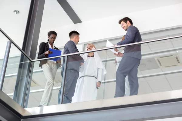 Business people in hall — Stock Photo, Image