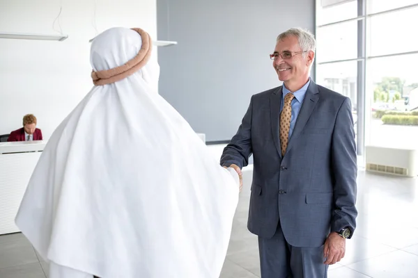 Handshake with Arabian partner — Stock Photo, Image