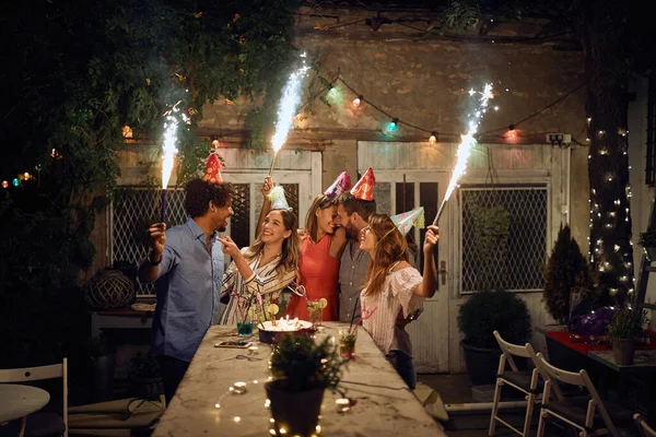 Group Cheerful Friends Holding Fireworks Open Air Birthday Party Beautiful — Stock Photo, Image