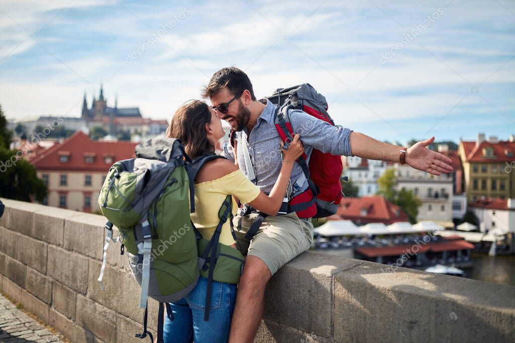 Tourist couple sightseeing in Prague; Traveller lifestyle