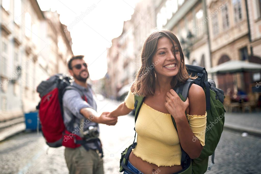 Tourist couple sightseeing in Prague; Traveller lifestyle