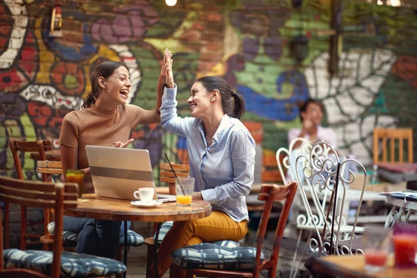 Two Cheerful Female Students Laughing While Spending Free Time Beautiful — Fotografia de Stock