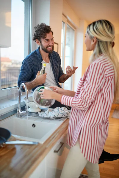Caucasian Blonde Washing Dishes Company Young Beardy Guy Curly Hair — Stock Photo, Image