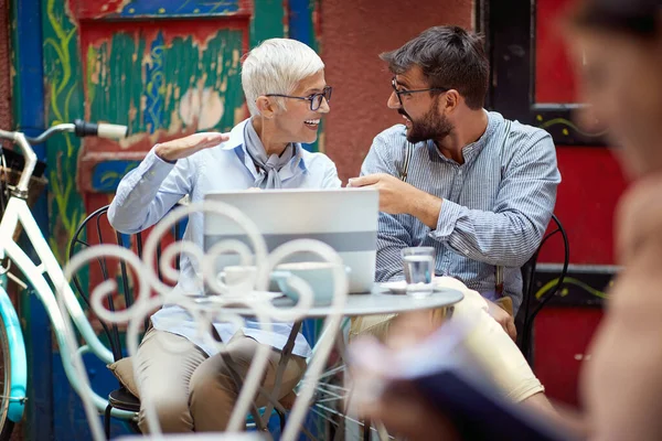 Older Woman Her Young Male Friend Having Interesting Conversation While — Stock Photo, Image