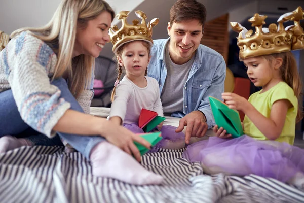 Kids Enjoying Playing Paper Boats Together Parents Cheerful Atmosphere Home — Stock Photo, Image