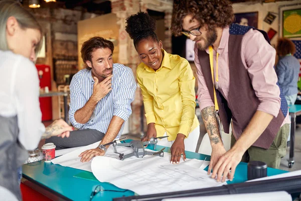 Group Young Creative Employees Reviewing Project Drafts Pleasant Atmosphere Office — Stock Photo, Image